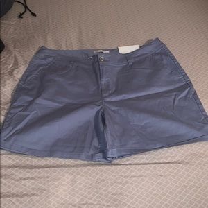 Light blue shorts.